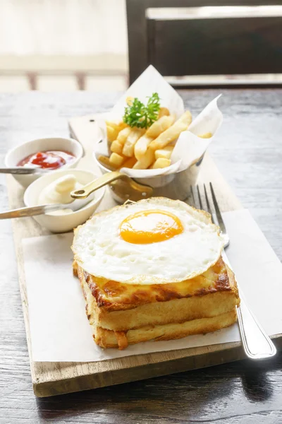 Egg on toast with french fried — Stock Photo, Image