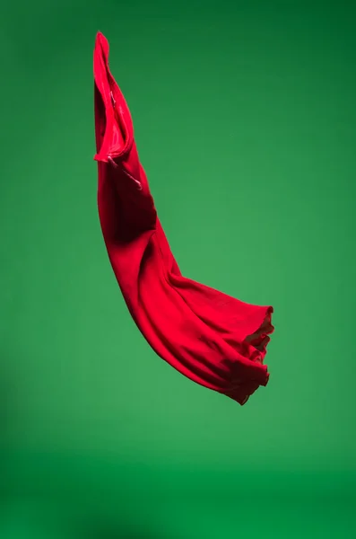 Rode stof in de lucht — Stockfoto