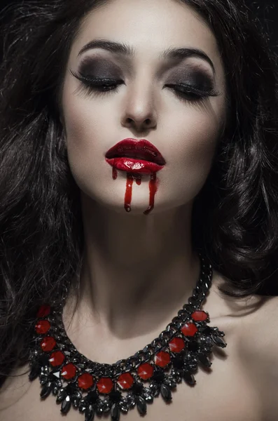 Portrait of a gothic vampire woman Royalty Free Stock Photos