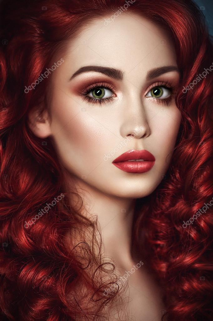 Redhead woman with green eyes Stock Photo by ©FlexDreams 69620783