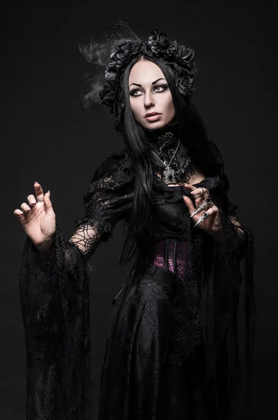 Gothic woman   in dark dress — Stock Photo, Image