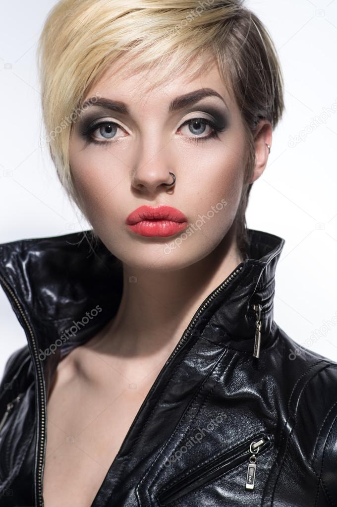 woman with short hairstyle and piercing