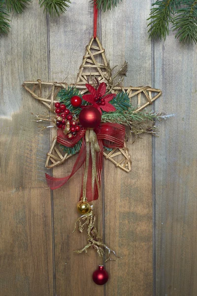 Christmas star on wooden background — Stock Photo, Image