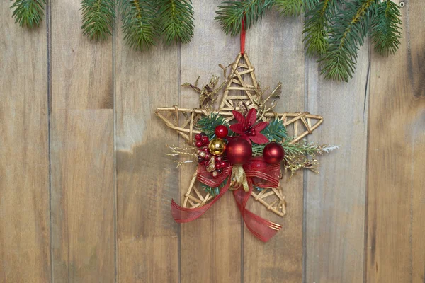 Christmas star on wooden background — Stock Photo, Image