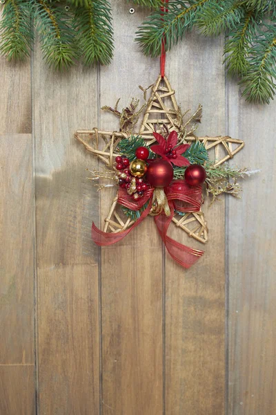Christmas star on wooden background — Stock Photo, Image