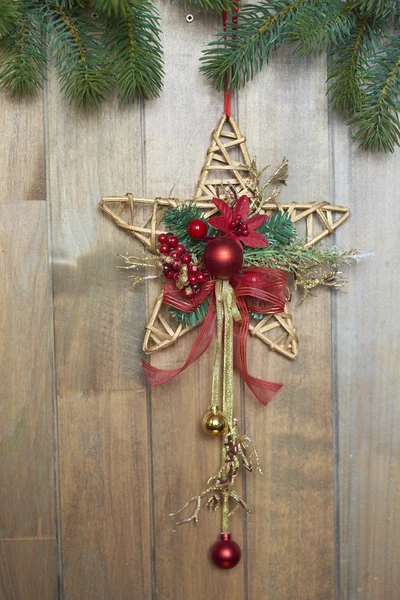 Christmas star on wooden background — Stock Photo, Image