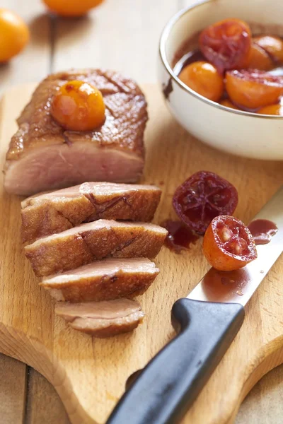 Roasted duck breast in citrus sauce Stock Photo