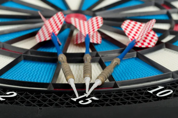 Darts board with a dart — Stock Photo, Image