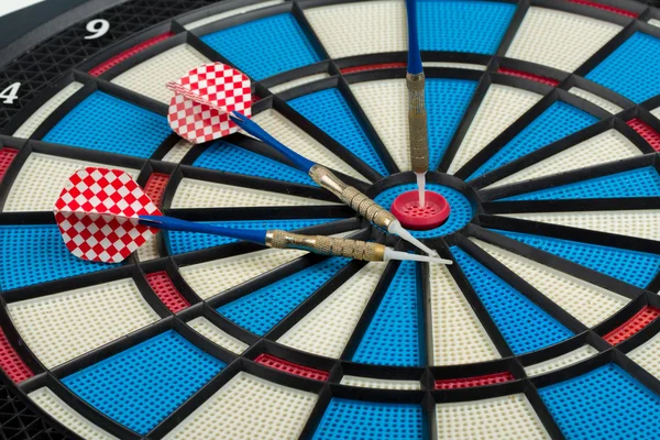 Darts board with a dart — Stock Photo, Image
