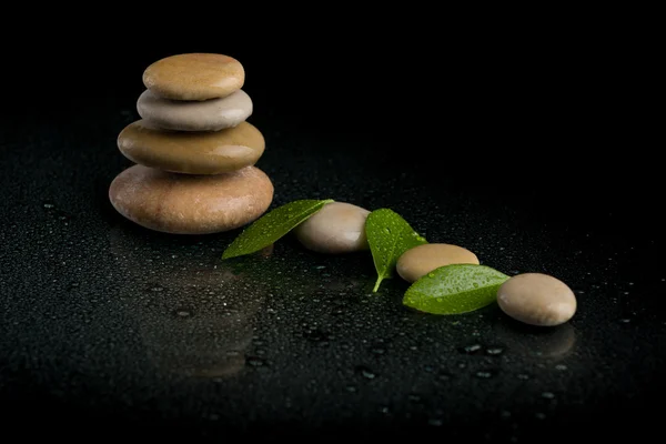 Balancing zen stones on black — Stock Photo, Image