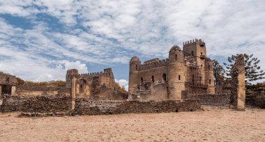 ruins of famous african castle Fasil Ghebbi, Royal fortress-city in Gondar, Ethiopia. Imperial palace is called Camelot of Africa. UNESCO World Heritage Site. clipart