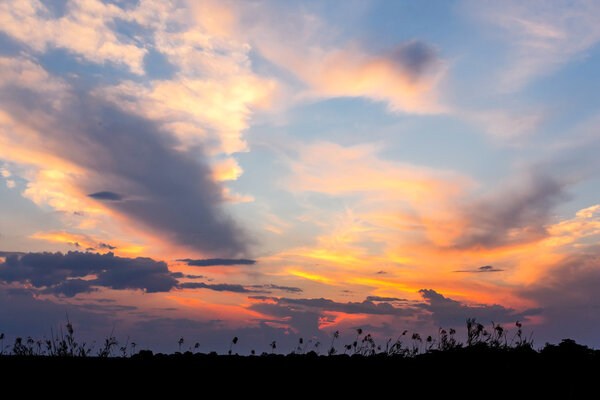 African sunset with dramatic clouds on sky, Kavango Namibia