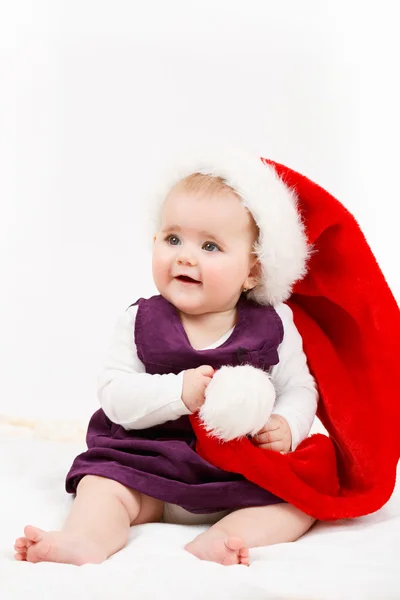 Child girl with Christmas santa hat — Stock Photo, Image