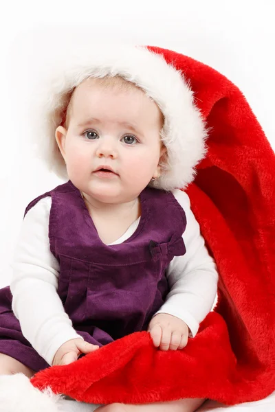 Enfant fille avec Noël santa chapeau — Photo