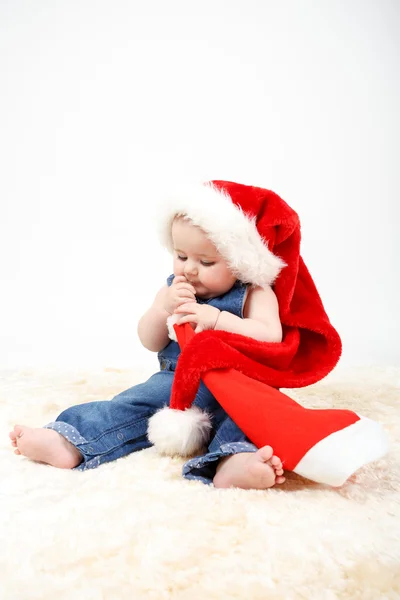 Child girl with Christmas santa hat — Stock Photo, Image