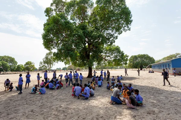 Happy Namibian school children waiting for a lesson.