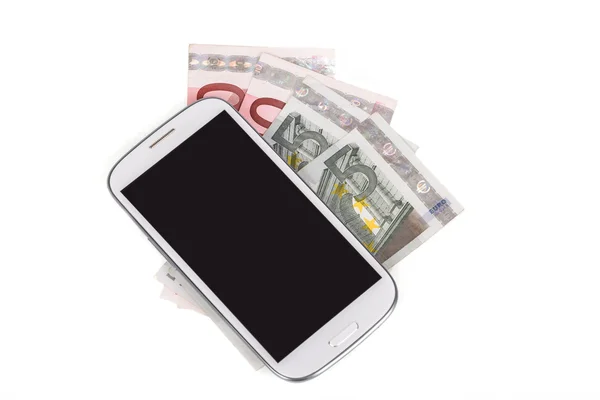 Cellphone and money on white — Stock Photo, Image