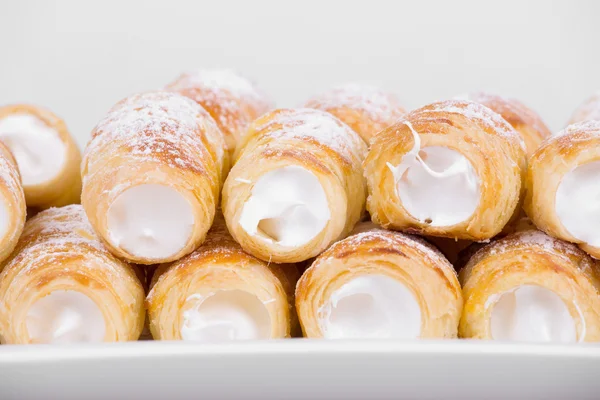 Tube of pastry filled with snow — Stock Photo, Image