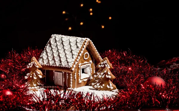 Holiday Gingerbread house on dark background — Stock Photo, Image