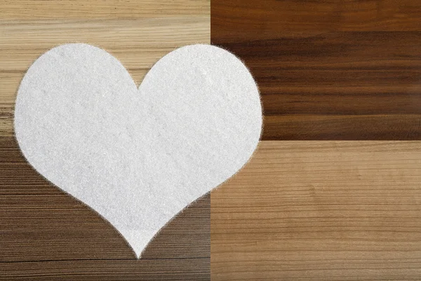 Valentine's snow hearts on a wooden background — Stock Photo, Image