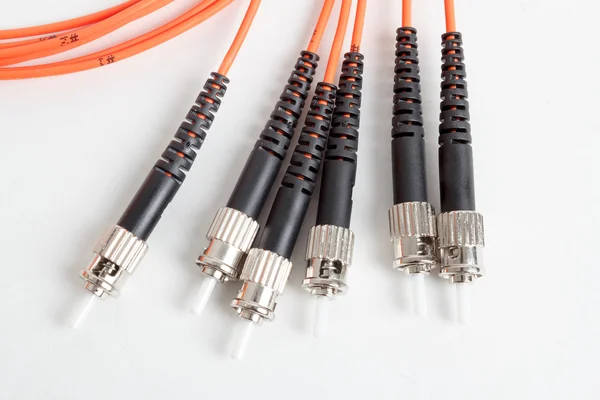 Orange fiber optic ST connector patchcord — Stock Photo, Image