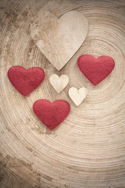 Valentine's wooden hearts on a retro background — Stock Photo, Image