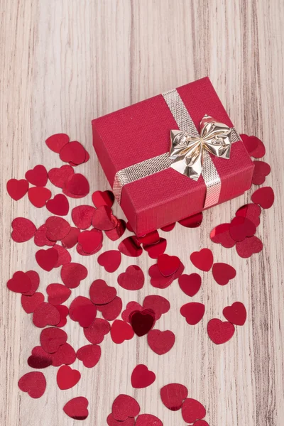 Red hearts confetti in box valentine love concept — Stock Photo, Image