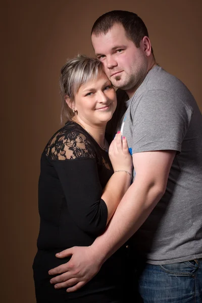 Beautiful xxl woman with her husband — Stock Photo, Image