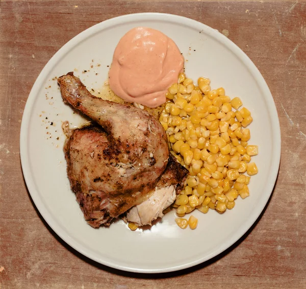 Grilled chicken with corn and hot sauce — Stock Photo, Image