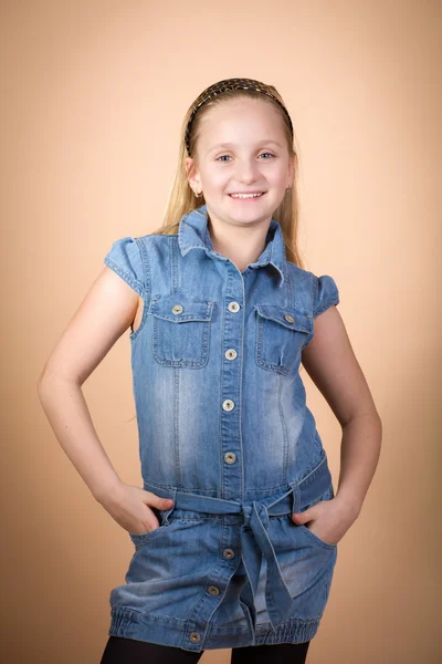 Fashion smiley European little girl posing — стоковое фото