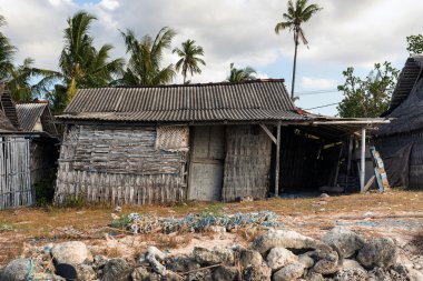indonesian house - shack on beach clipart