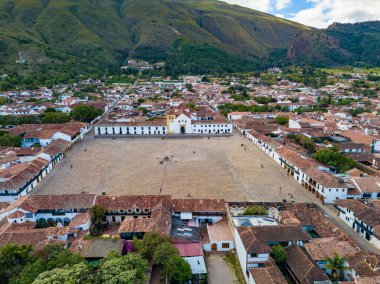 Aerial view of the Plaza Mayor, the largest fully cobblestone main square in Colombia, surrounded by preserved colonial architecture in Villa de Leyva, Boyaca, Colombia