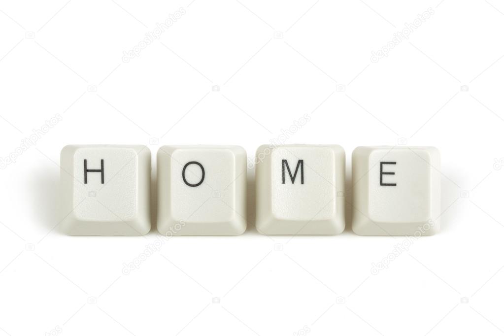 home from scattered keyboard keys on white