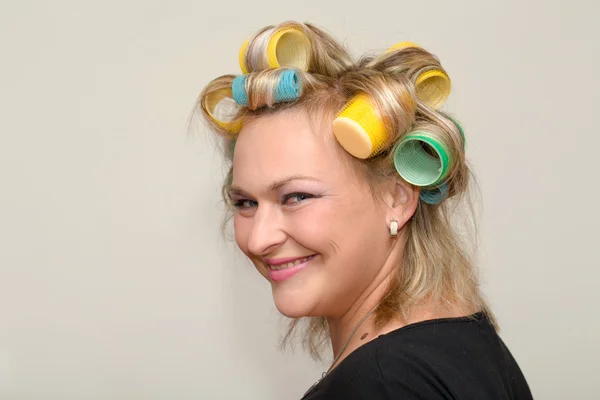 Woman with curler — Stock Photo, Image