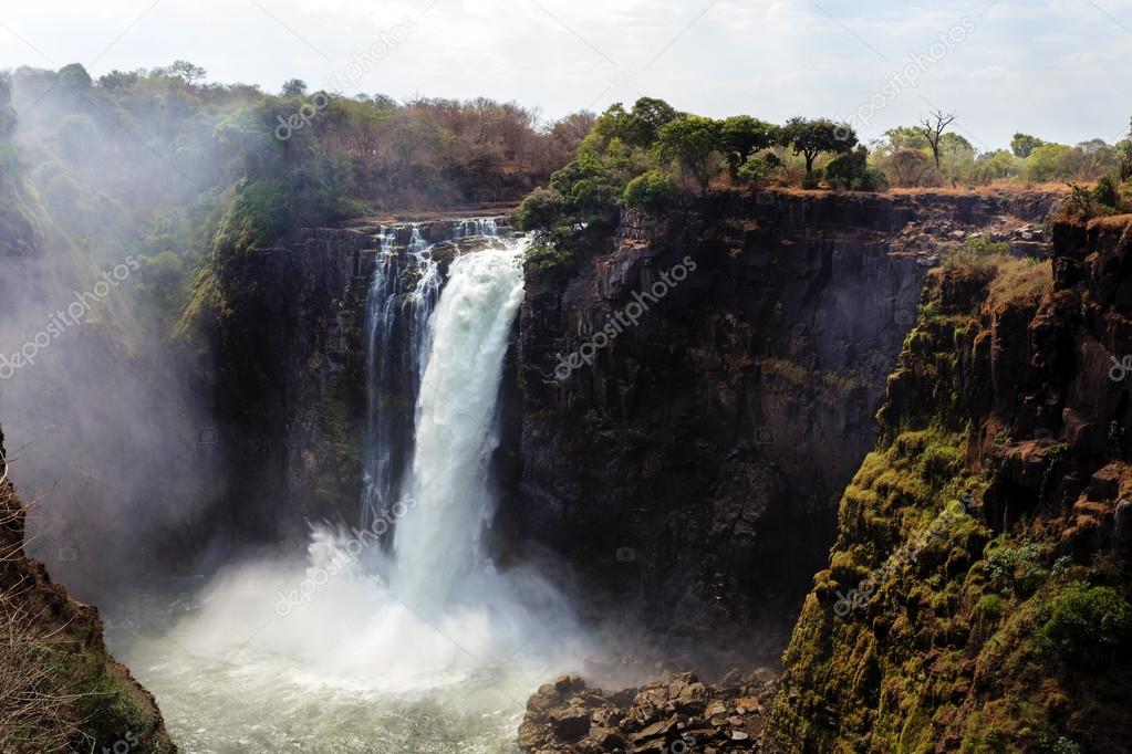 The Victoria falls with mist from water