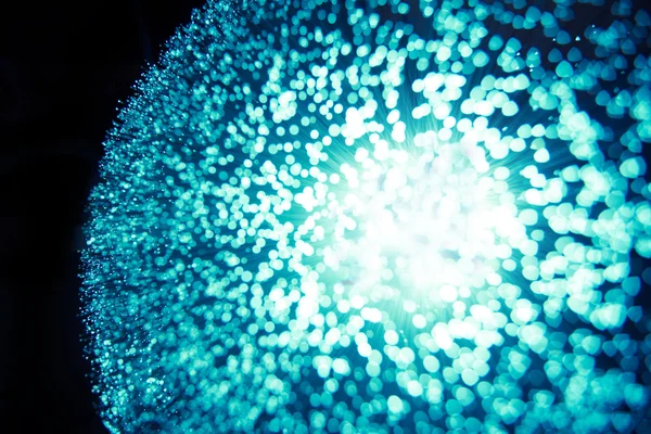 Glasfaser-Hintergrund mit vielen Lichtpunkten Stockfoto