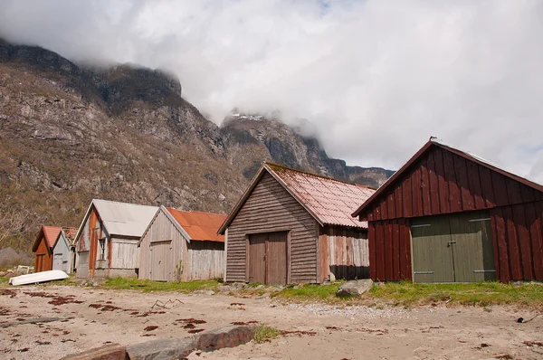 The boathouses at the fjord coast and clouds — Stock Photo, Image
