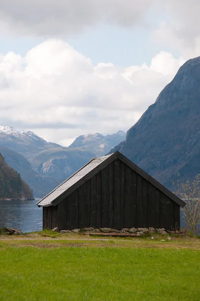 De boathut in de fjorden Stockfoto