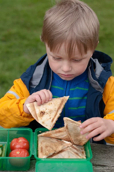 The child eating sandwiches — Stock Photo, Image