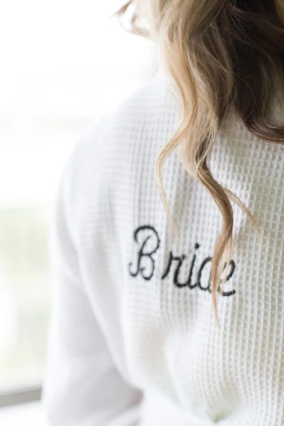 Bride in a robe — Stock Photo, Image