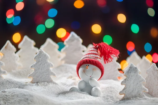 Pupazzo di neve e alberi di Natale — Stock Photo