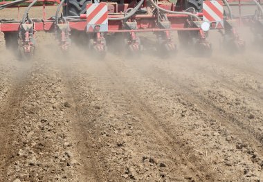 Planting corn trailed planter in the field  clipart