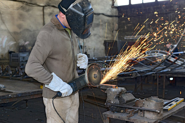 Stripping metal products abrasive wheel