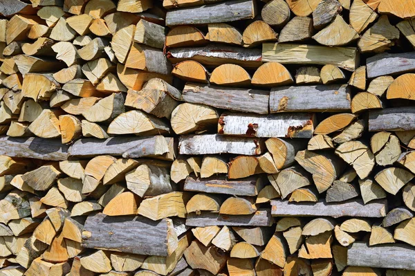 Chipped fire wood in a background photo. — Stock Photo, Image