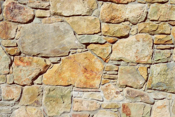 Fragmento de uma parede de uma pedra lascada — Fotografia de Stock