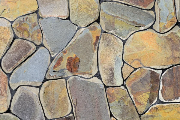 Fragment of a wall from a chipped stone — Stock Photo, Image