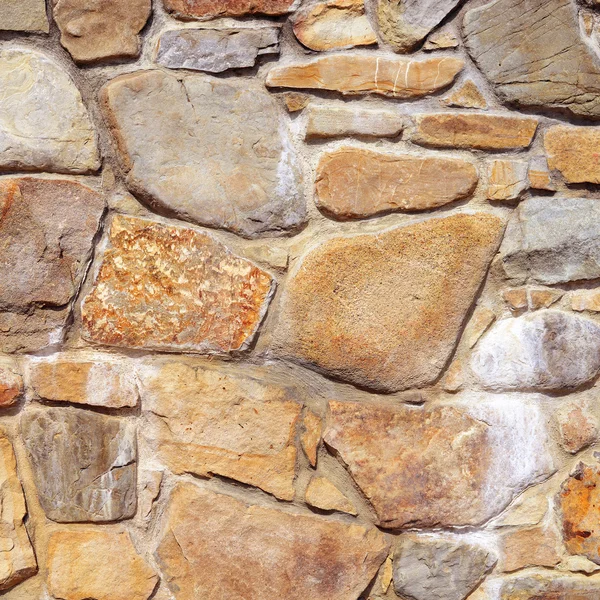 Fragmento de uma parede de uma pedra lascada — Fotografia de Stock