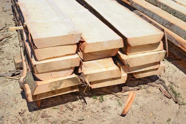 Not edging board in stacks in an industrial landscape — Stock Photo, Image