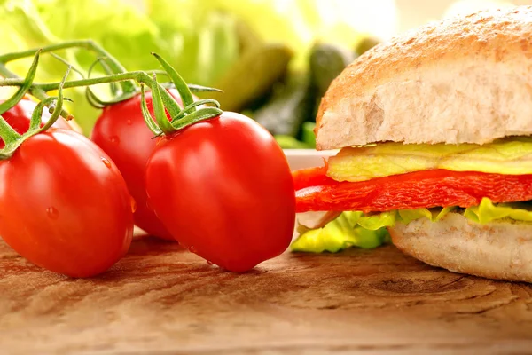 Vegetarian sandwich on wooden background — Stock Photo, Image