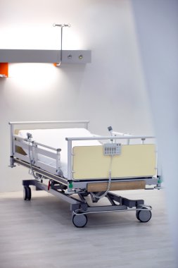 POZNAN, POLAND - APRIL 12. 2016: Empty bed in hospital room. Poz